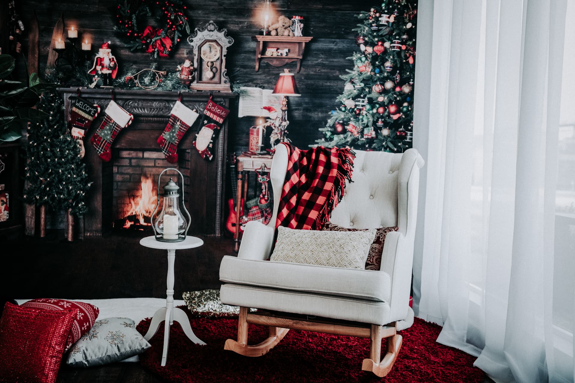 The fireside Christmas set with stockings, tree and a cream rocking chair