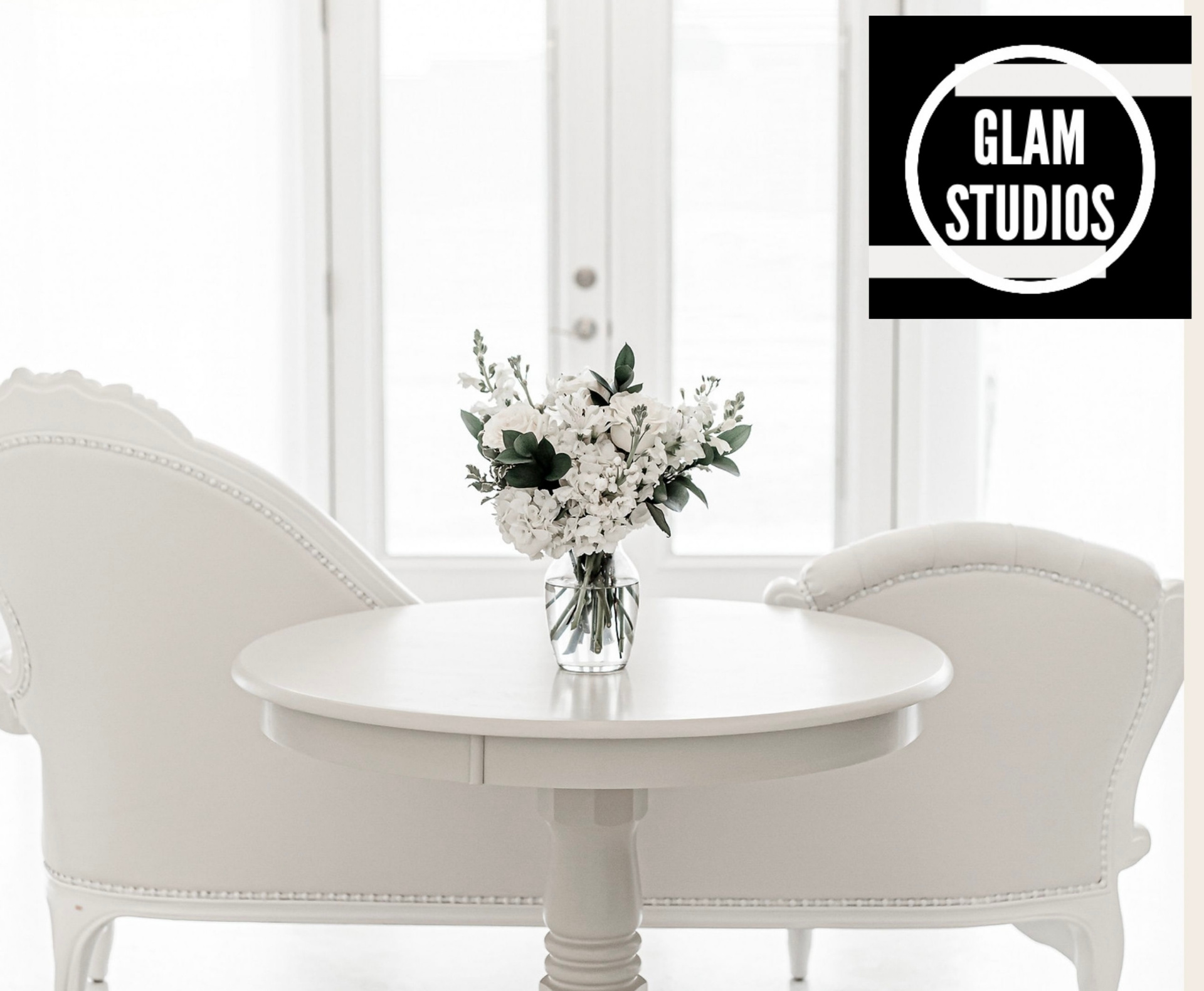 Inside Glam Studios with natural light and backdrops