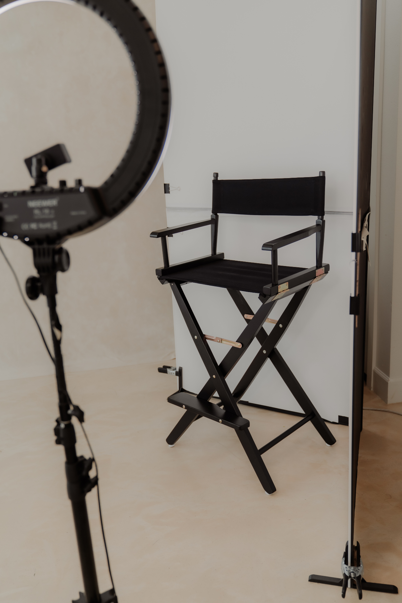 Director's chair with ring light setup